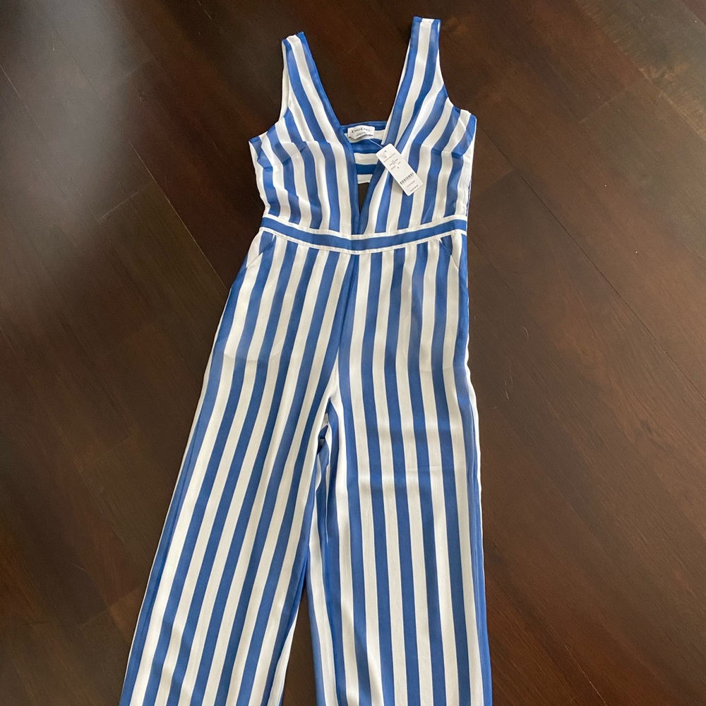 BEBE striped jumpsuit size 4